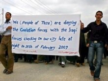 Iraq -- Iraqi Shi'ite Turkmen chant slogans and hold banners during a demonstration in Khormato Village Kirkuk, 04Mar2007
