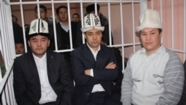 Opposition leaders Kamchybek Tashiev, Sadyr Japarov, and Talant Mamytov (left to right) in court in Bishkek earlier in January.