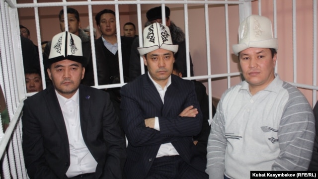 Opposition leaders Kamchybek Tashiev, Sadyr Japarov, and Talant Mamytov (left to right) in court in Bishkek earlier in January.
