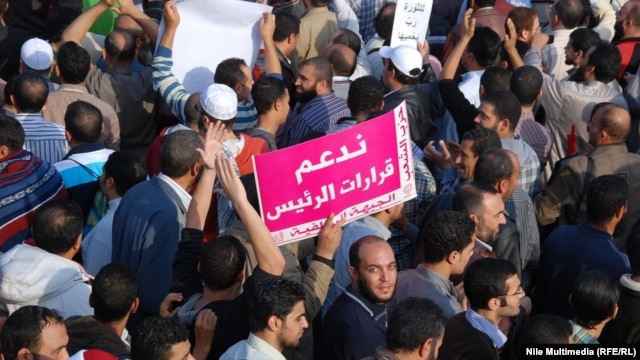 President Muhammad Morsi's supporters rallied December 1 at Cairo University.