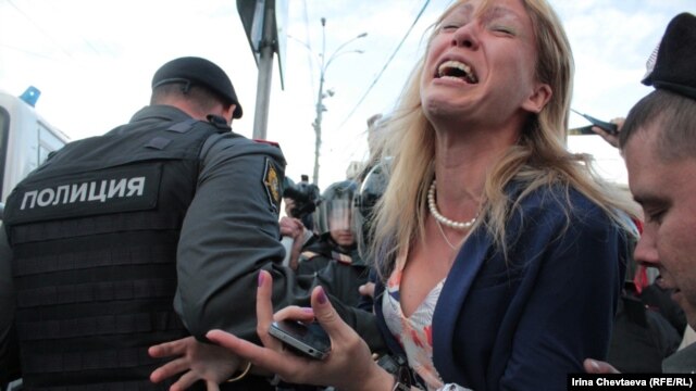 Some 300 protesters gathered on Moscow's Triumph Square before police intervened. (Photo gallery below)