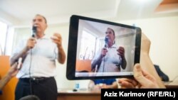 United opposition candidate Camil Hasanli says, if elected, he will form a government of "national reconciliation."