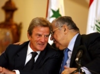 Kouchner (left) with Iraqi President Talabani in Baghdad today (epa)