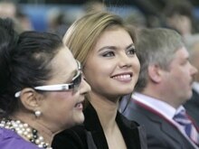 Russia -- Former rhythmic gymnastics world champion Alina Kabayeva (C) and her former coach Irina Viner (L) attend the United Russia party congress in Moscow, 14Apr2008