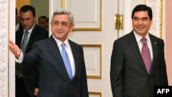 Armenian President Serzh Sarkisian (left) welcomes his Turkmen counterpart, Gurbanguly Berdymukhammedov, in Yerevan on November 29.