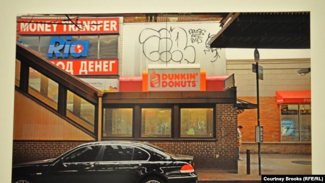 An exhibit photo of a doughnut shop in Brighton Beach, a Russian-speaking neighborhood in New York