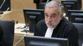 International Criminal Court prosecutor Luis Moreno-Ocampo in a courtroom in The Hague