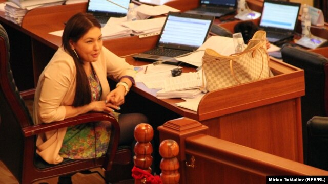 "I think most of my colleagues would not see the need to impose a dress code on journalists or other visitors to our building," says Shirin Aitmatova, who represents the ruling Ata Meken party.