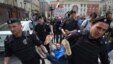 Russian riot police detain gay rights activist Nikolai Alekseyev during an unauthorized gay-rights rally in central Moscow in May.
