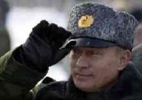 President Putin in military uniform observing a military-satellite launch in February 2004 (epa)