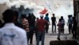 Bahraini Shi'ite youth protest in solidarity with jailed dissident Abdel Hadi Khawaja and prominent rights activist Nabeel Rajab, in Bilad Al-Qadeem, a suburb of Manama, on May 17.