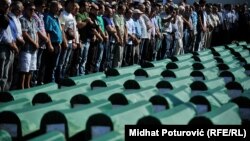 A collective funeral is held for victims found in Tomasica, the largest mass grave uncovered in Europe since World War II.