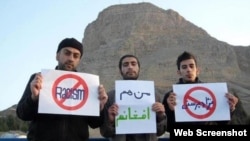 Iranians protest against the banning of Afghans in Isfahan from a public park on April 1, also known as Nature Day. One of the signs reads, "I Am Also An Afghan."