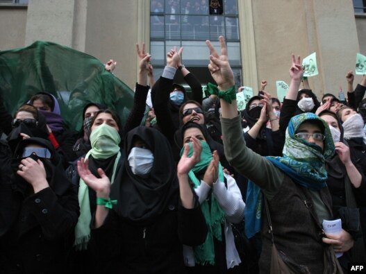 Opposition supporters demonstrate at Tehran University in December 2009.
