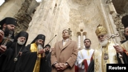 Georgian Patriarch Ilia II (right) blesses Mikheil Saakashvili (center) in the 11th-century Bagrati Cathedral after the latter's reelection as president in 2008.