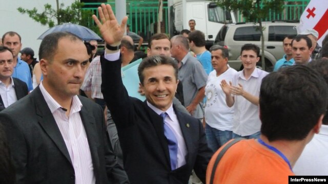 Georgian Dream leader Bidzina Ivanishvili greets supporters in Batumi on August 5.