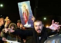 Demonstrators outside a gay club in Moscow in early May (AFP)