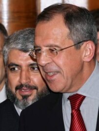 Russian Foreign Minsiter Sergei Lavrov (right) with Hamas leader Khalid Mish'al in Moscow on March 3. (epa)