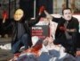Performans glumaca sa maskama Vladimira Putina i Bašara el Asada u znak protivljenja zbog nasilja u Siriji, Njujork, ispred zgrade UN-a 24. januar 2012