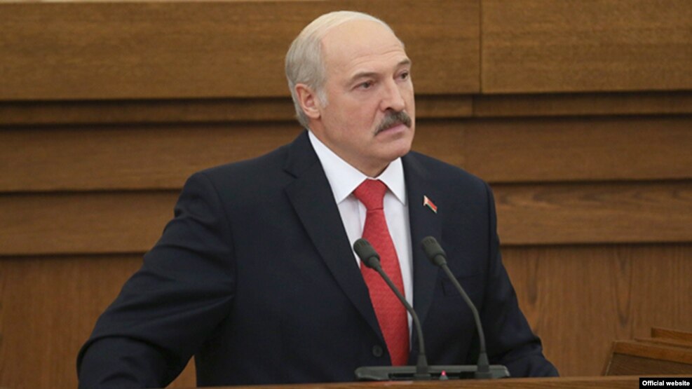 Belarusian President Alyaksandr Lukashenka addresses a session of parliament in Minsk on October 7.
