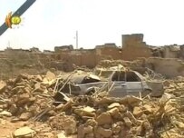 A TV shot of ruined buildings after the blasts (AFP)