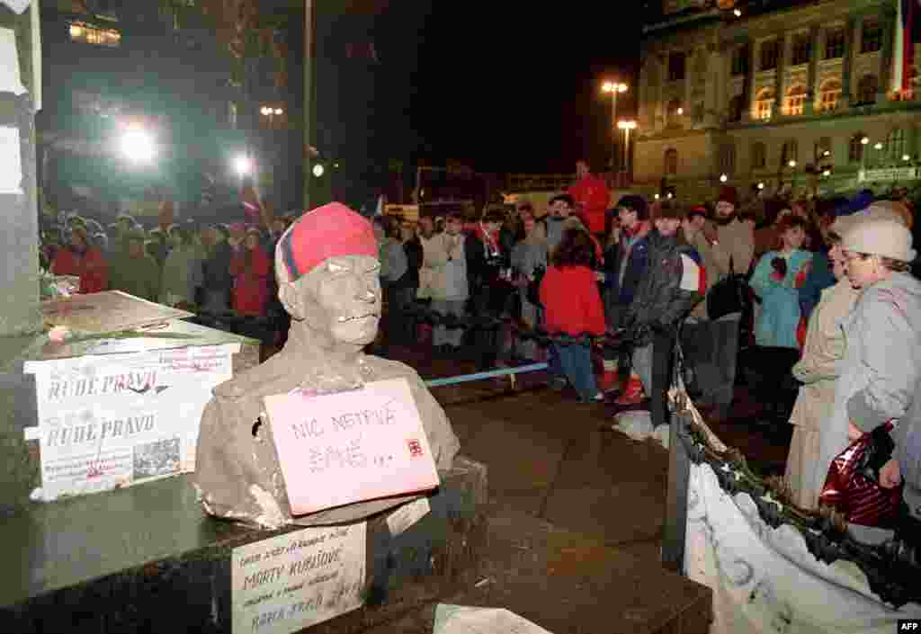 A bust of Soviet leader Josef Stalin, with a caption reading "Nothing lasts forever," is seen on Prague's Wenceslas Square on the 10th day of demonstrations and the first day of a general strike, November 27.