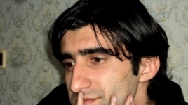 "Azadlig" reporter Ramin Deko says he was warned to stop his opposition activities. 