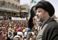 Shi'ite cleric Hazim al-Araji, an aide to Shi'ite cleric Muqtada al-Sadr, addresses a demonstration against U.S. President George Bush's visit to Iraq on June 13 (epa)
