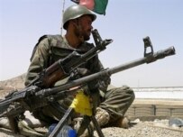 An Afghan National Army soldier keeps watch at a checkpoint in the Arghandab district of Kandahar as part of an operation against the Taliban (AFP)