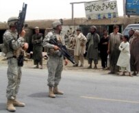 U.S soldiers secure the site of a suicide car bomb attack in Kandahar last summer (file photo) (epa)