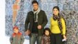 Haseeba Shaheed (r) with her family at RFE/RL's Prague headquarters.