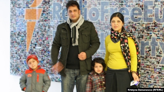 Haseeba Shaheed (r) with her family at RFE/RL's Prague headquarters.