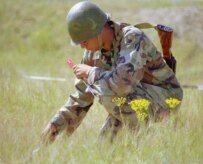 An Armenian soldier in military exercises run under NATO's Partnership for Peace program searches for signs of illegal border crossings (file photo) (ITAR-TASS)