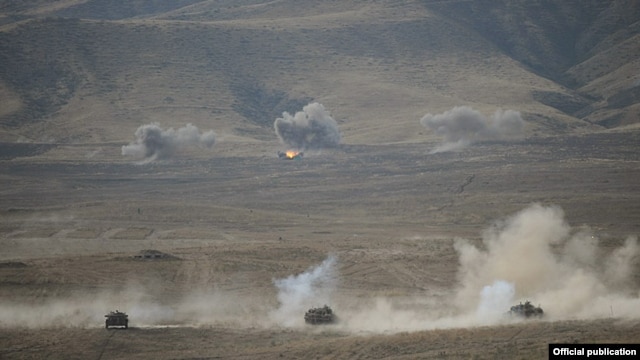 Nagorno-Karabakh - Tanks fire live rounds during a military exercise, 23Oct2012.