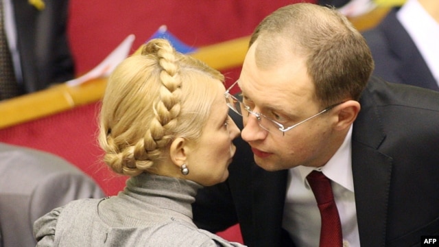 The parties of former Ukrainian Prime Minister Yulia Tymoshenko (left) and ex-parliamentary speaker Arseniy Yatsenyuk are among those which will be joining forces in upcoming elections.