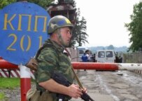 A Russian peacekeeper at a checkpoint on the Georgian-Abkhaz border (ITAR-TASS)