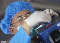 An international monitoring expert at Iran's Isfahan uranium-enrichment facility earlier this year (official site)