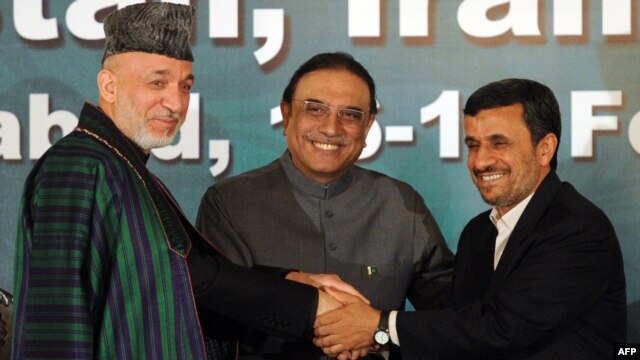 Pakistani President Asif Ali Zardari is flanked by his Afghan and Iranian counterparts, Hamid Karzai (left) and Mahmud Ahmadinejad, after a joint press conference in Islamabad in February.