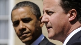 British Prime Minister David Cameron (right) and U.S. President Barack Obama (file photo)