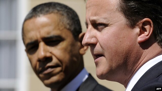 British Prime Minister David Cameron (right) and U.S. President Barack Obama (file photo)