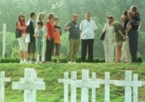 People gather at a cemetery in Vukovar in August 2001 to commemorate Croatian victims of the 1991-95 war