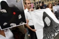 Ethnic Iranians protesting against the stoning of women at a football match in Germany in June (AFP)