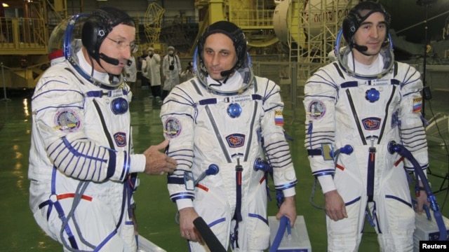 ISS crew members (left to right) U.S. astronaut Daniel Burbank and Russian cosmonauts Anton Shkaplerov and Anatoly Ivanishin train at the Baikonur cosmodrome in November.