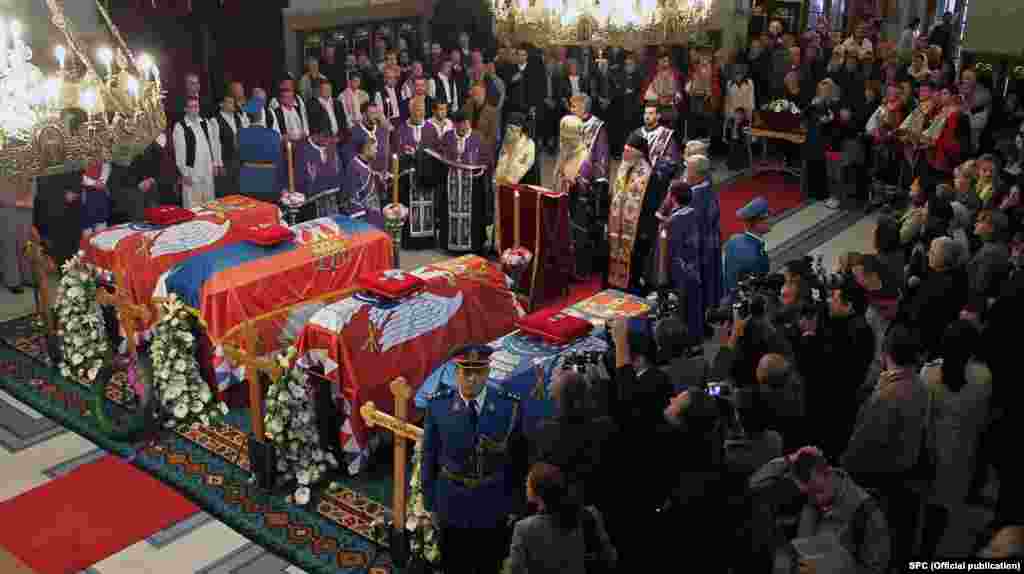 The four coffins of the Karadjordjevic family, former Yugoslavia's royal family, lie inside Belgrade's Congregational Church on May 24 during a religious ceremony. They were to be reburied in the crypt of St. George's Church, the resting place of their ancestors in Oplenac.