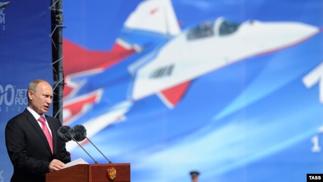 Russian President Vladimir Putin speaks in Zhukovsky outside Moscow at the opening of an international air festival dedicated to the 100th anniversary of the Russian Air Force on August 11.