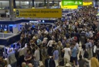 Lines of passengers waiting at London's Heathrow this morning (epa)