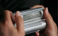 Canisters containing uranium are displayed during a special ceremony in the northeastern holy city of Mashhad, Iran, April 11 (Fars)