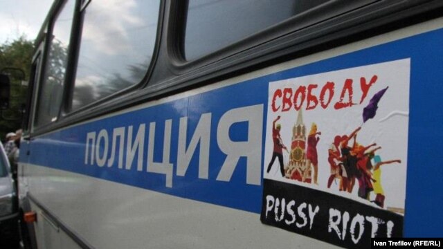 A sticker reading "Free Pussy Riot" on a police vehicle in Moscow.