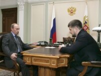 Putin (left) and Kadyrov in Novo-Ogaryovo today (ITAR-TASS)