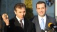 Georgian Prime Minister Bidzina Ivanishvili (L) and Defense Minister Irakli Alasania speak to the media in Tbilisi, 06Feb2013